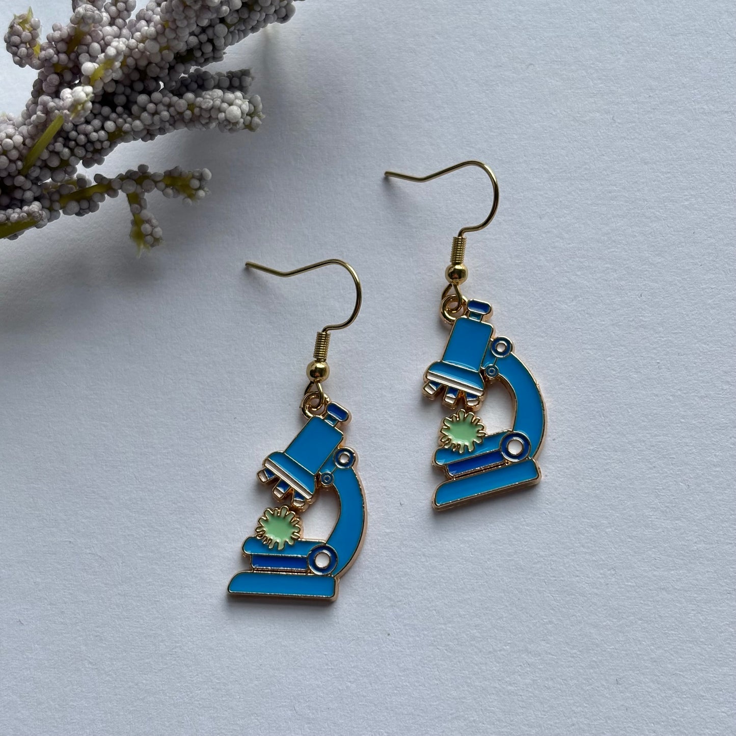 Gold and blue dangle science microscope earrings on gold plated hooks