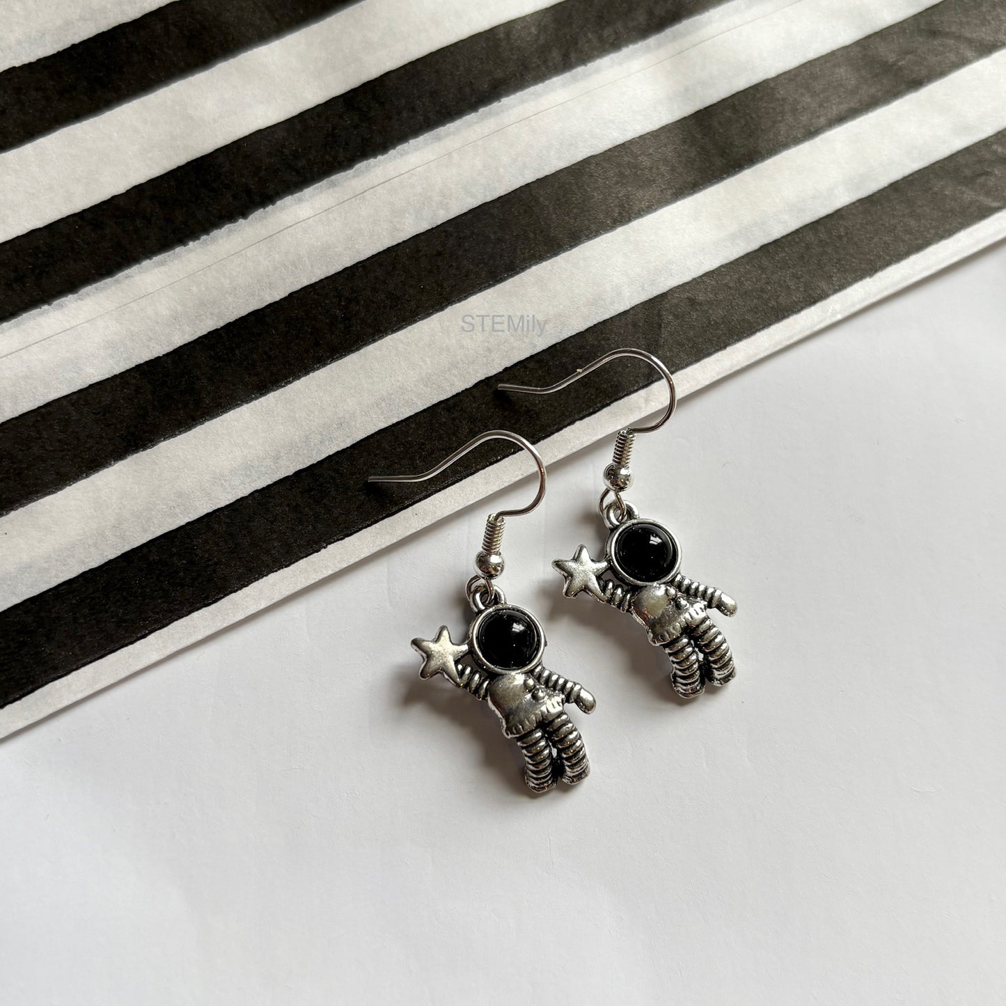 Silver spaceman astronaut drop dangle earrings