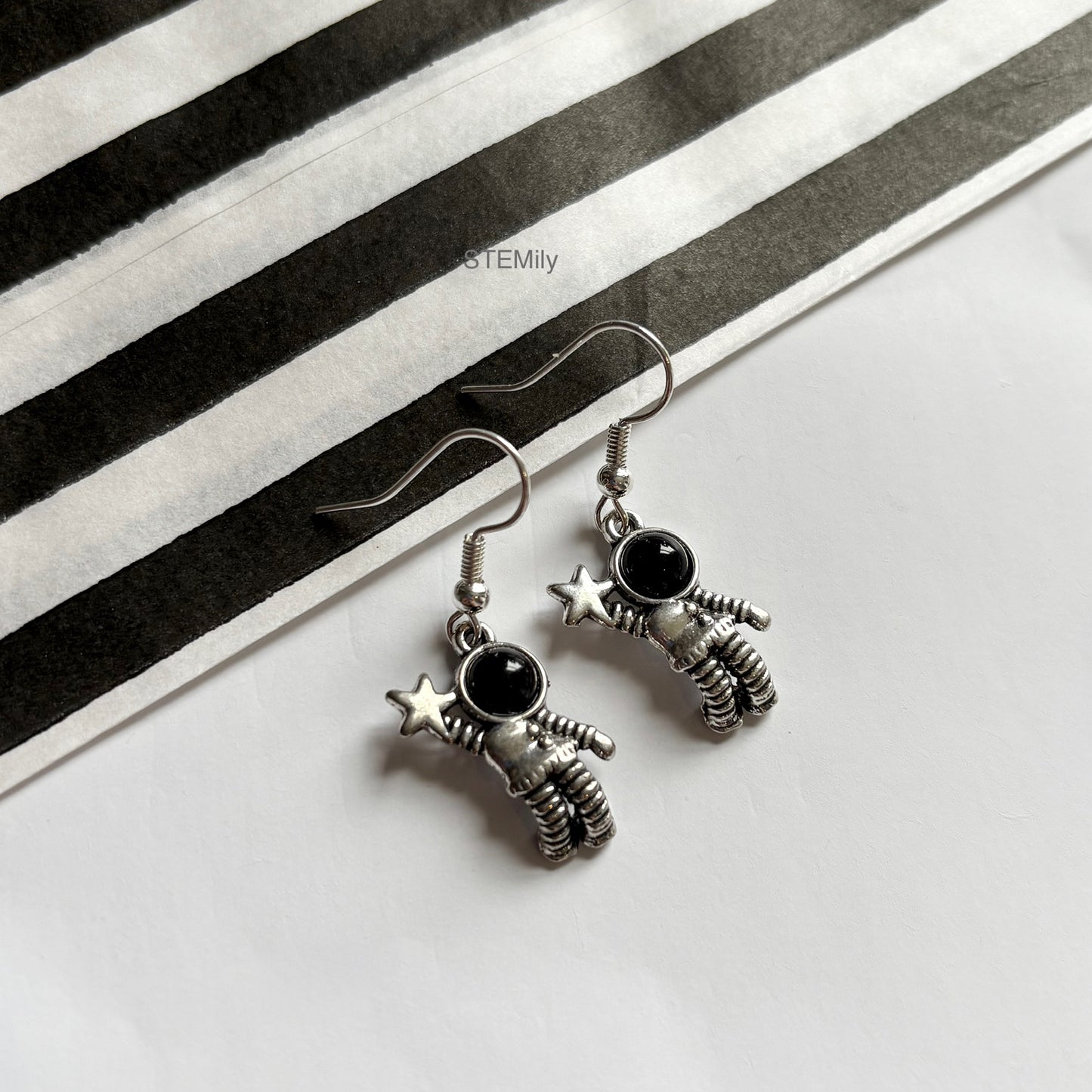 Silver spaceman astronaut drop dangle earrings