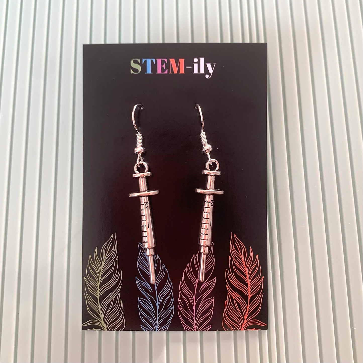Cool quirky little silver syringe science biology nurse earrings on silver plated hooks