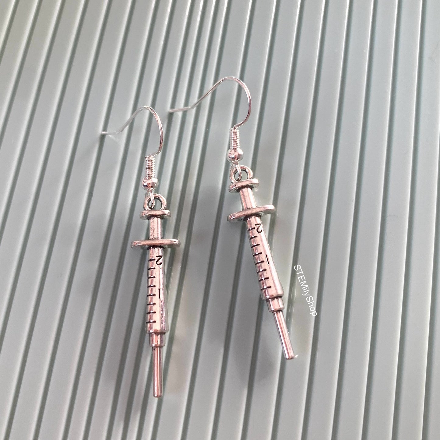 Cool quirky little silver syringe science biology nurse earrings on silver plated hooks