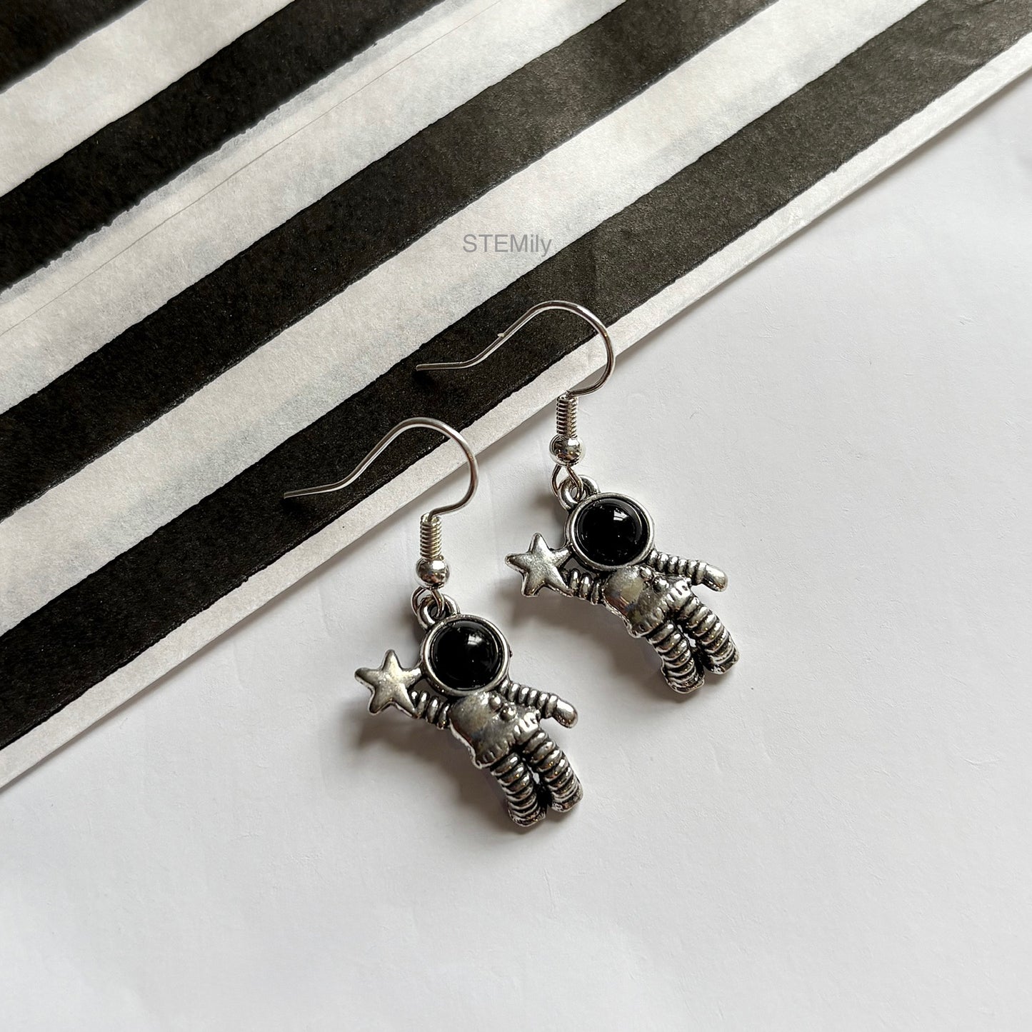 Silver spaceman astronaut drop dangle earrings