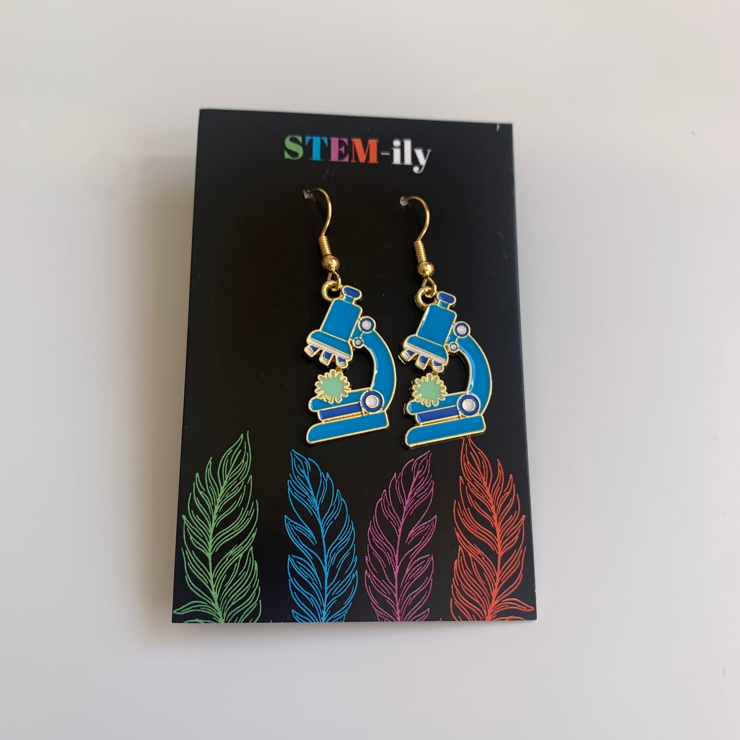 Gold and blue dangle science microscope earrings on gold plated hooks