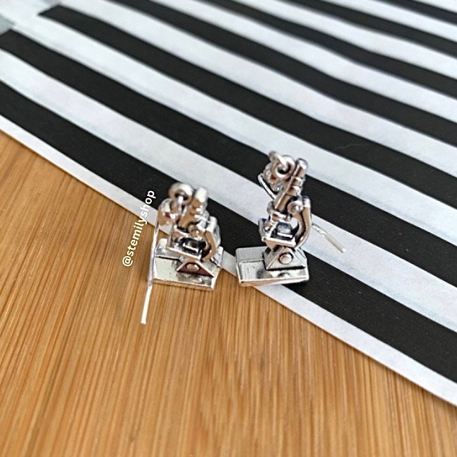 Cool quirky silver microscope science biology earrings on hypoallergenic surgical steel hooks