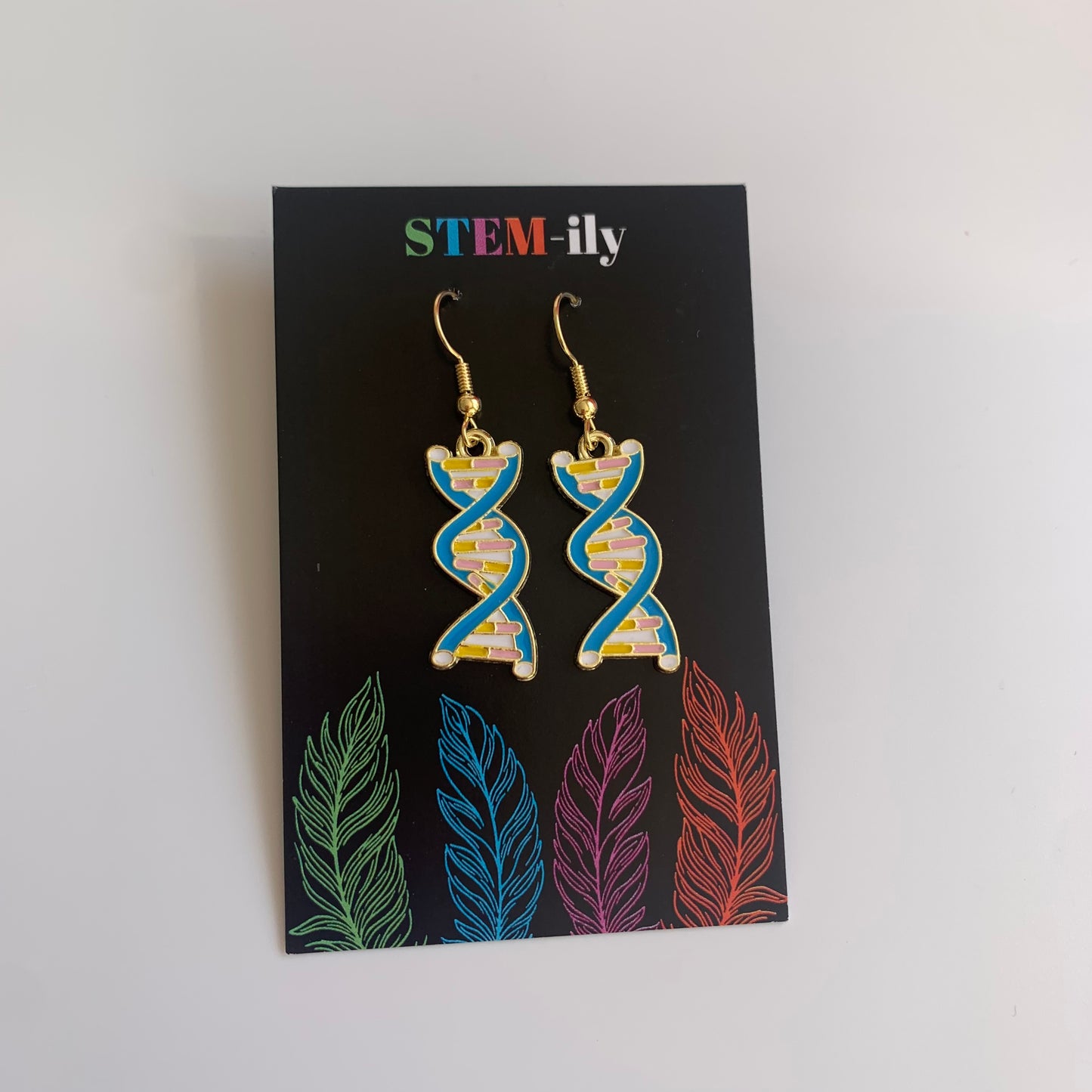 Gold science DNA blue dangle earrings