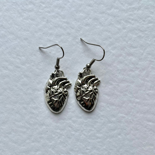 Silver or red anatomical heart dangle earrings