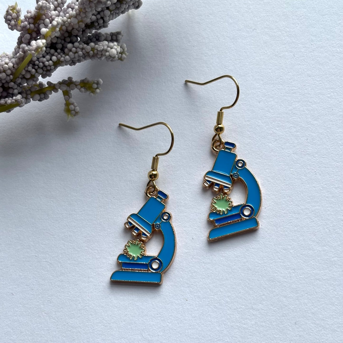 Gold and blue dangle science microscope earrings on gold plated hooks
