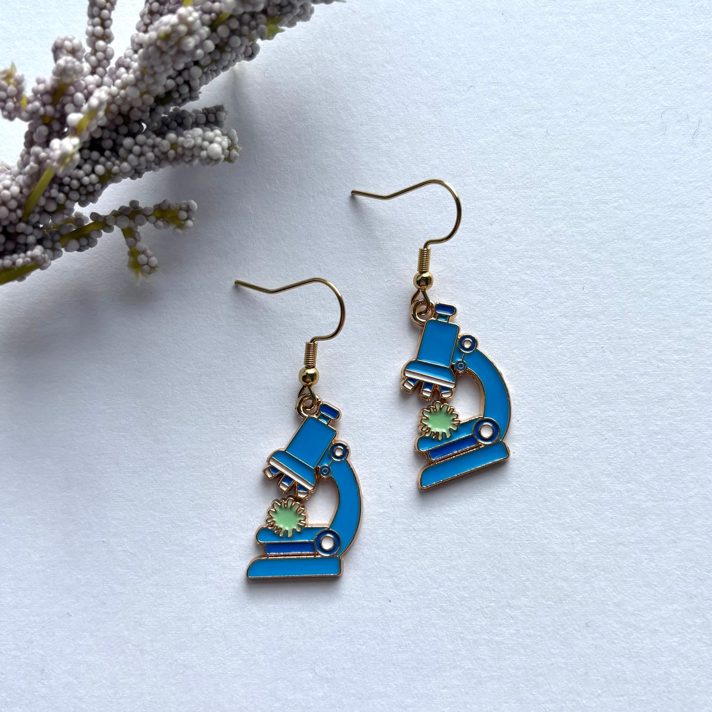 Gold and blue dangle science microscope earrings on gold plated hooks
