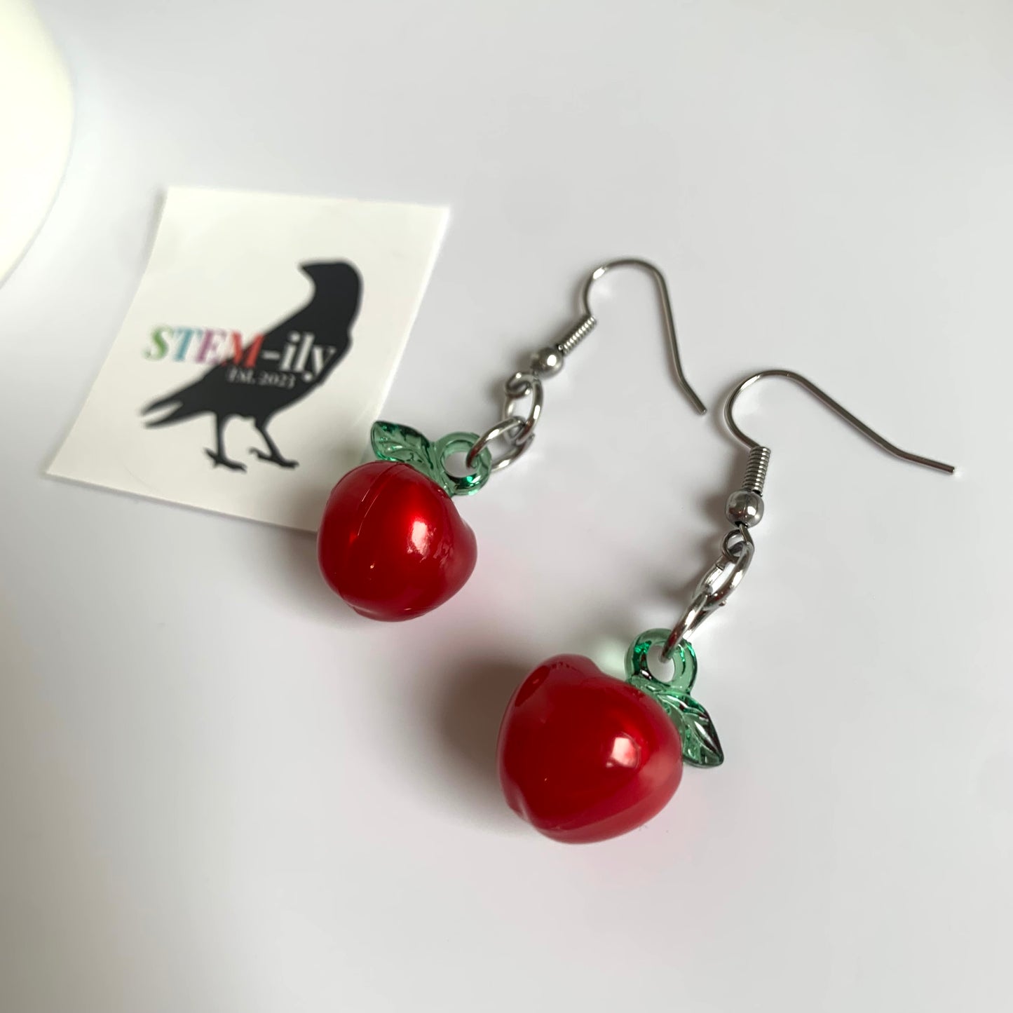 Red and green stainless steel apple teacher earrings